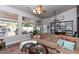 Open living area with large windows and built-in shelving at 758 S Lagoon Dr, Gilbert, AZ 85233
