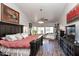 Large main bedroom with king-size bed and sitting area at 758 S Lagoon Dr, Gilbert, AZ 85233