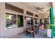 Covered patio with dining table and pool view at 758 S Lagoon Dr, Gilbert, AZ 85233