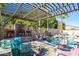 Relaxing pool area with a pergola and fireplace at 758 S Lagoon Dr, Gilbert, AZ 85233