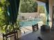 Inviting pool area viewed from covered patio at 758 S Lagoon Dr, Gilbert, AZ 85233