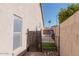 Private side yard access with a gated entrance at 758 S Lagoon Dr, Gilbert, AZ 85233