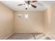 Bright bedroom with ceiling fan and neutral walls at 7712 S 72Nd Ave, Laveen, AZ 85339