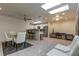 Kitchen with breakfast bar, white cabinets, and stainless steel appliances at 8082 E Via Del Desierto --, Scottsdale, AZ 85258