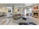 Open concept living area with fireplace, seating, and dining area at 8082 E Via Del Desierto --, Scottsdale, AZ 85258