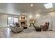 Spacious living room with fireplace and access to patio at 8082 E Via Del Desierto --, Scottsdale, AZ 85258