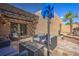 Relaxing patio with seating area, pergola, and beautiful landscaping at 8082 E Via Del Desierto --, Scottsdale, AZ 85258