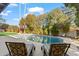 Inviting pool area with patio furniture and lush landscaping at 8526 E Monterey Way, Scottsdale, AZ 85251