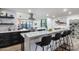 Sleek kitchen boasting modern cabinetry, a large island, and high-end appliances at 8556 E Sage Dr, Scottsdale, AZ 85250