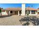 Large backyard with gravel and a view of the house at 9715 W Escuda Dr, Peoria, AZ 85382