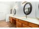 Bathroom boasts double vanity and large mirrors at 9715 W Escuda Dr, Peoria, AZ 85382