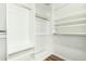 Large walk-in closet with shelving and hanging rods at 9715 W Escuda Dr, Peoria, AZ 85382