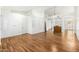 Open dining area with wood-look floors and kitchen views at 9715 W Escuda Dr, Peoria, AZ 85382
