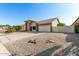 Single-story home with stone accents and a two-car garage at 9715 W Escuda Dr, Peoria, AZ 85382