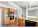 Island kitchen with granite counters and stainless steel appliances at 9715 W Escuda Dr, Peoria, AZ 85382