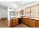 Kitchen with granite counters, wood cabinets and island at 9715 W Escuda Dr, Peoria, AZ 85382