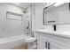 Clean bathroom with white vanity, quartz countertop and bathtub at 10127 W Forrester Dr, Sun City, AZ 85351