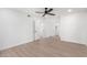 Bright bedroom with ceiling fan and ample closet space at 10127 W Forrester Dr, Sun City, AZ 85351