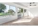 Sunroom with sliding glass doors offering views of the backyard at 10127 W Forrester Dr, Sun City, AZ 85351