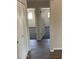 Clean hallway with tile flooring and access to bedrooms at 10220 N 36Th N Ave, Phoenix, AZ 85051