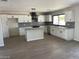 Modern kitchen boasting white shaker cabinets, granite counters, and stylish tile backsplash at 10220 N 36Th N Ave, Phoenix, AZ 85051