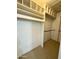 Large walk-in closet with built-in shelving and hanging rod at 1051 N 84Th Pl, Scottsdale, AZ 85257