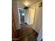 Hallway with wood-look floors and doors at 1051 N 84Th Pl, Scottsdale, AZ 85257