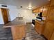 Kitchen with granite countertop and island at 1051 N 84Th Pl, Scottsdale, AZ 85257