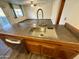 Kitchen sink and dishwasher at 1051 N 84Th Pl, Scottsdale, AZ 85257