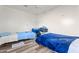 Small bedroom with two twin beds and light blue bedding at 11624 N 25Th Ave, Phoenix, AZ 85029