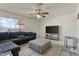 Spacious living area with sectional sofa and flat-screen TV at 11624 N 25Th Ave, Phoenix, AZ 85029