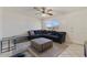 Living room featuring a sectional sofa and large windows at 11624 N 25Th Ave, Phoenix, AZ 85029