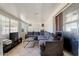 Cozy living space with sectional sofa and sliding glass door at 11624 N 25Th Ave, Phoenix, AZ 85029