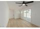 Bedroom with sliding glass doors leading to backyard at 126 E Northern Ave, Phoenix, AZ 85020