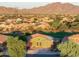 Aerial view of house and surrounding community with golf course at 12963 S 183Rd Ave, Goodyear, AZ 85338