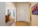 Bright entryway with arched doorways and view into dining area at 12963 S 183Rd Ave, Goodyear, AZ 85338