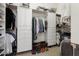 Large walk-in closet with ample shelving and hanging space at 13036 W Fetlock Trl, Peoria, AZ 85383