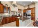 Modern kitchen with granite countertops and stainless steel appliances at 13036 W Fetlock Trl, Peoria, AZ 85383