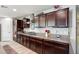 Well-equipped kitchen featuring granite countertops and dark cabinetry at 1436 N Claiborne --, Mesa, AZ 85205