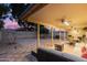 Relaxing covered patio with seating area and view of the backyard at 18807 N 2Nd Ave, Phoenix, AZ 85027