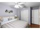 Spacious bedroom with double bed and mirrored closet doors at 18807 N 2Nd Ave, Phoenix, AZ 85027
