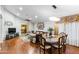 Open dining room with hardwood floors and large windows at 18807 N 2Nd Ave, Phoenix, AZ 85027