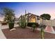 Desert landscaping enhances this charming single-story home's curb appeal at 18807 N 2Nd Ave, Phoenix, AZ 85027
