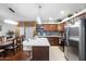 Modern kitchen with island and stainless steel appliances at 18807 N 2Nd Ave, Phoenix, AZ 85027