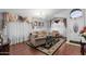 Living room with chandelier and comfortable seating at 18807 N 2Nd Ave, Phoenix, AZ 85027