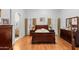 Spacious main bedroom with hardwood floors and large dresser at 18807 N 2Nd Ave, Phoenix, AZ 85027