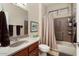 Main bathroom with tub shower combo at 18932 N Aztec Point Dr, Surprise, AZ 85387