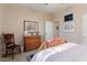 Bedroom with wooden dresser and cozy bedding at 18932 N Aztec Point Dr, Surprise, AZ 85387