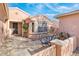 Home entrance with a decorative security door, desert landscaping, and a cozy, welcoming feel at 18932 N Aztec Point Dr, Surprise, AZ 85387