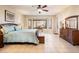 This spacious main bedroom features natural light from bay windows and neutral decor at 18932 N Aztec Point Dr, Surprise, AZ 85387